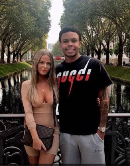 Weston McKennie and Laura Rype pose for a picture.